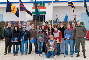George Mason University students stand in front of the United Nations Disengagement Observer Force building in the Golan Heights region near the Syrian/Israeli border