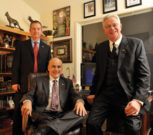 Burnam, seated, worked with former Vietnam war dog handlers Larry Chilcoat, at right, and Richard Deggans to create a memorial fundraising foundation.