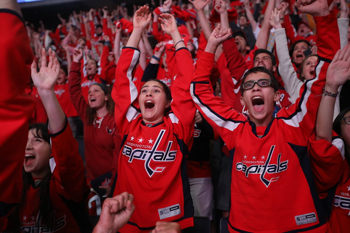 capitals fans cheering in crowd