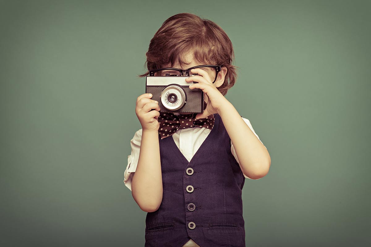 kid taking picture