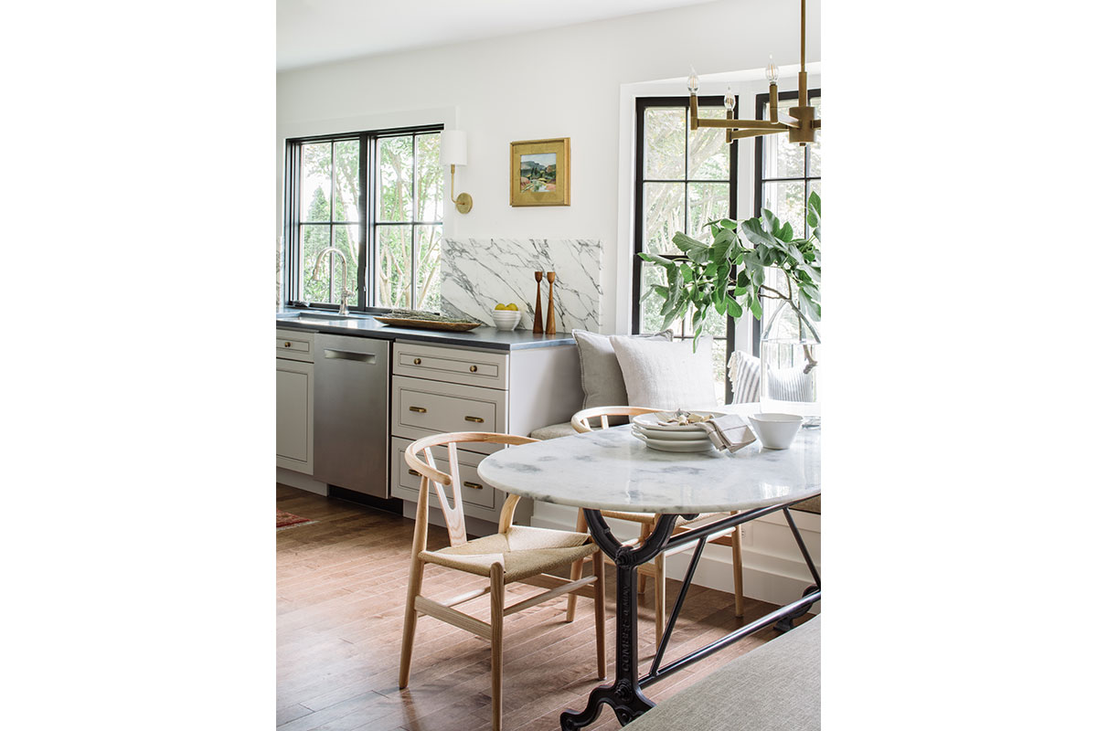marble kitchen table with wooden chairs