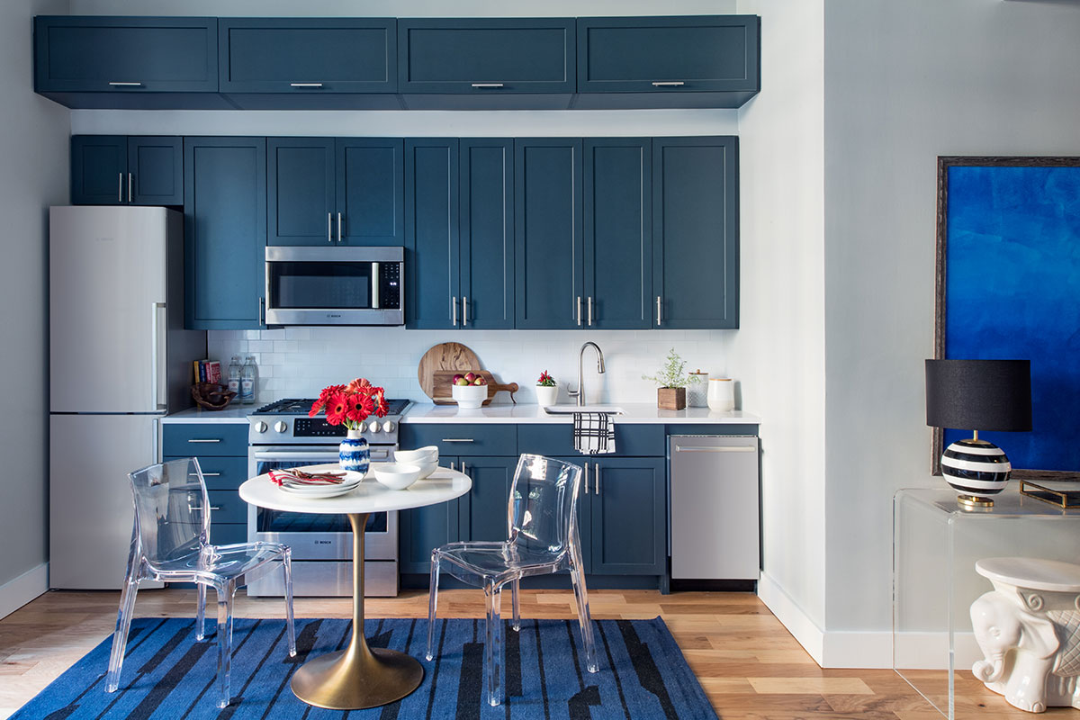 kitchen with navy blue cabinetry