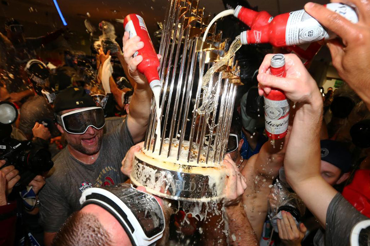 nats players pouring beer on trophy