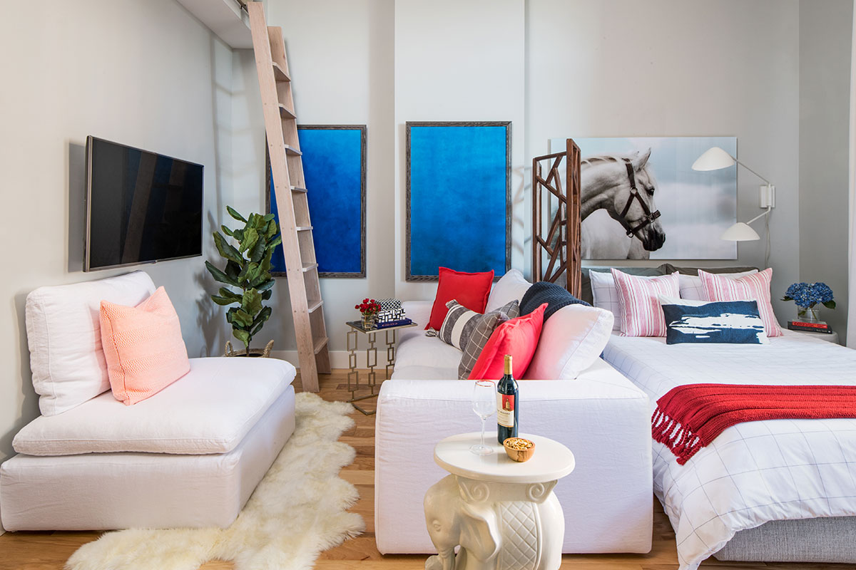 studio apartment with red, white and blue