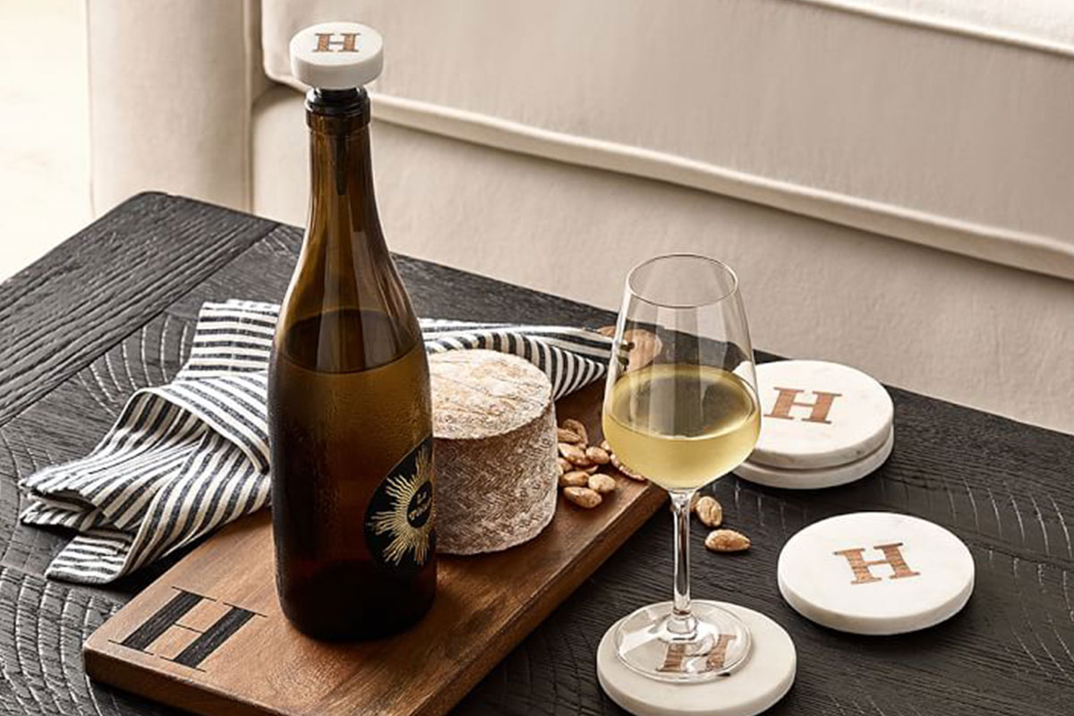 champagne with lettered coasters