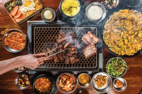 grilling food at table
