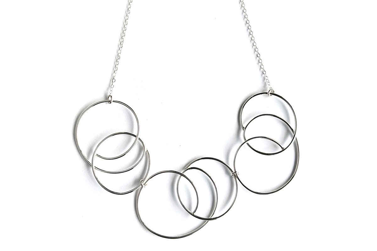 swirly silver necklace