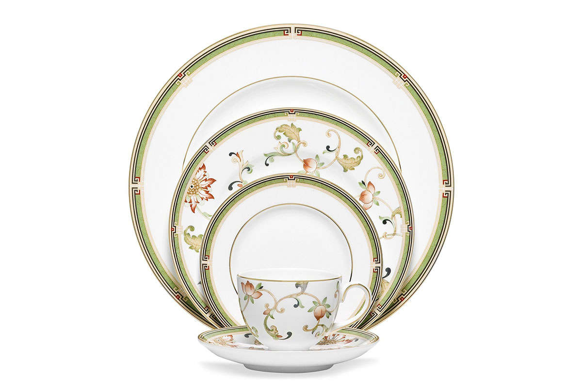 white plate set with green edges
