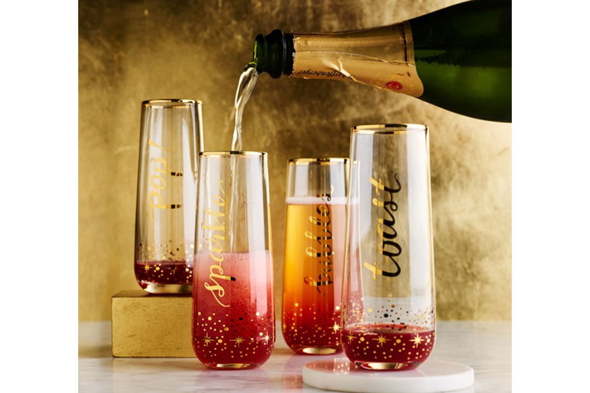 stemless champagne flutes with red in them