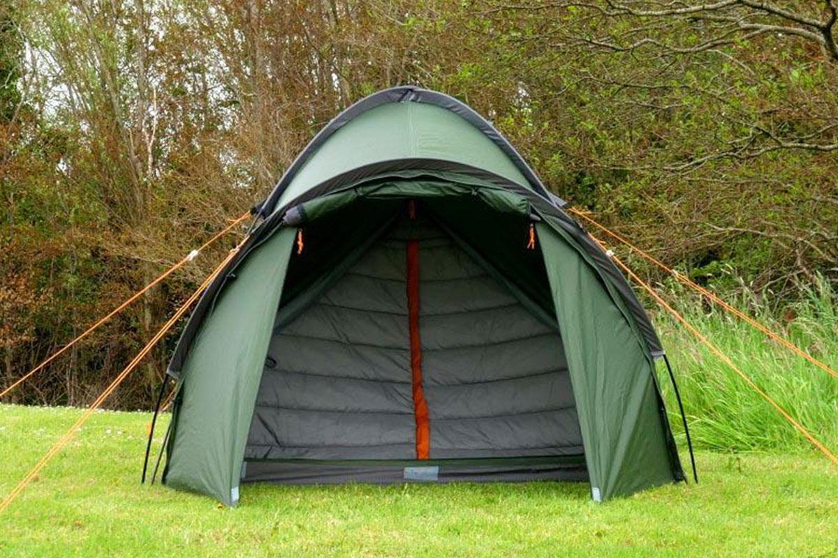 green double tent on green grass