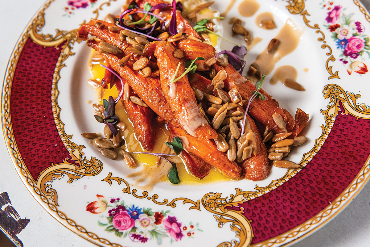 carrots with nuts on ornate plate