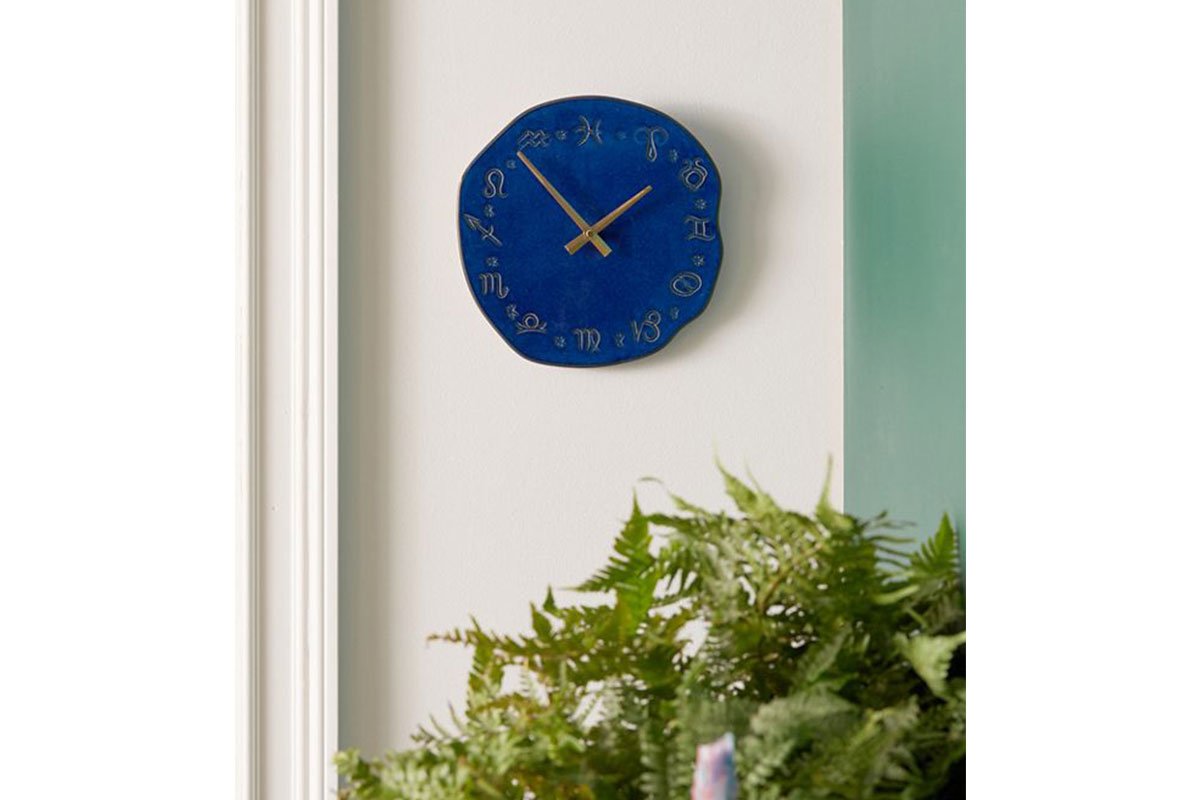 zodiac blue clock on wall