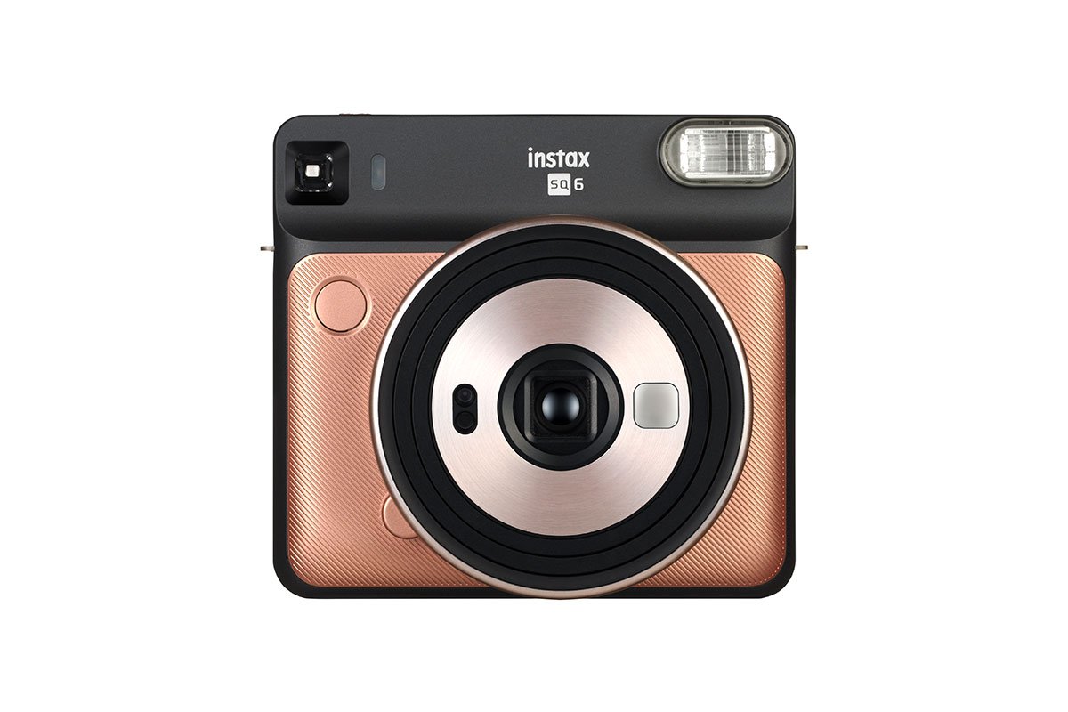 pink and black instax camera
