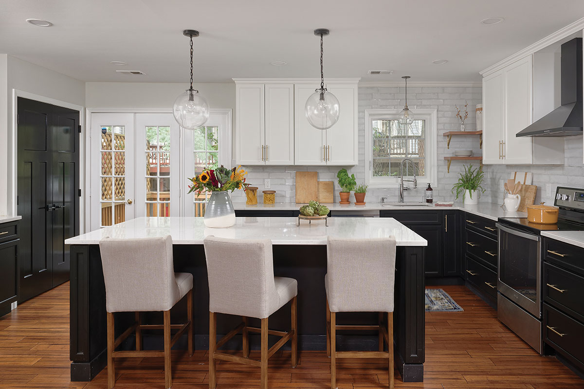 white kitchen with white cabinets and white counter tops and large island