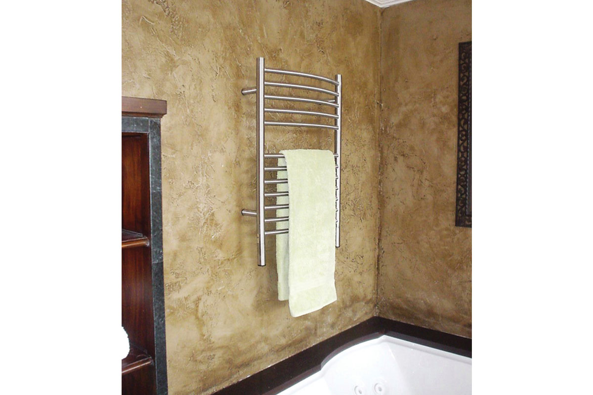 silver towel warmer with towel on it