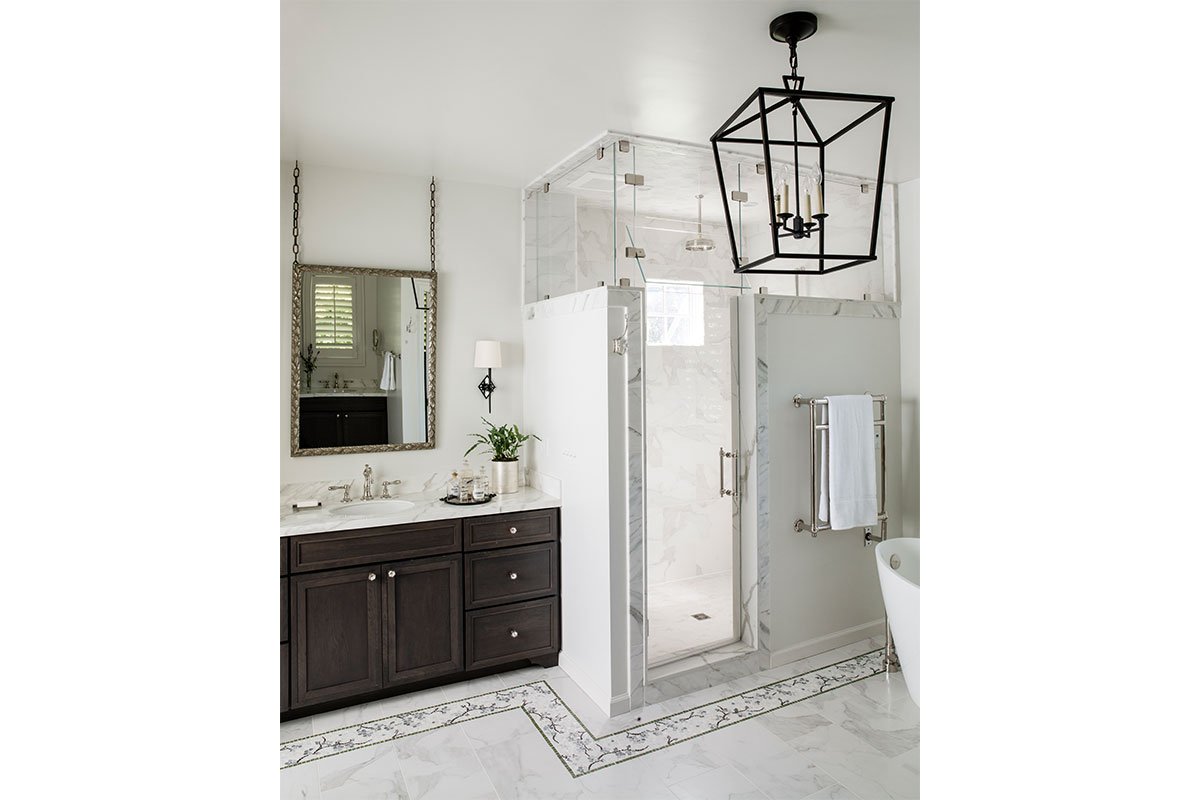 all white bathroom with marble shower