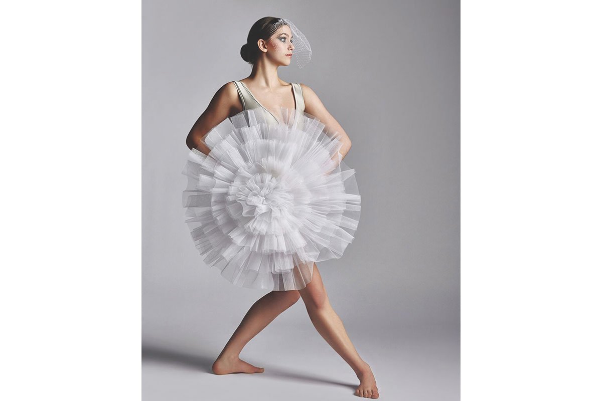 ballerina in white puffy dress