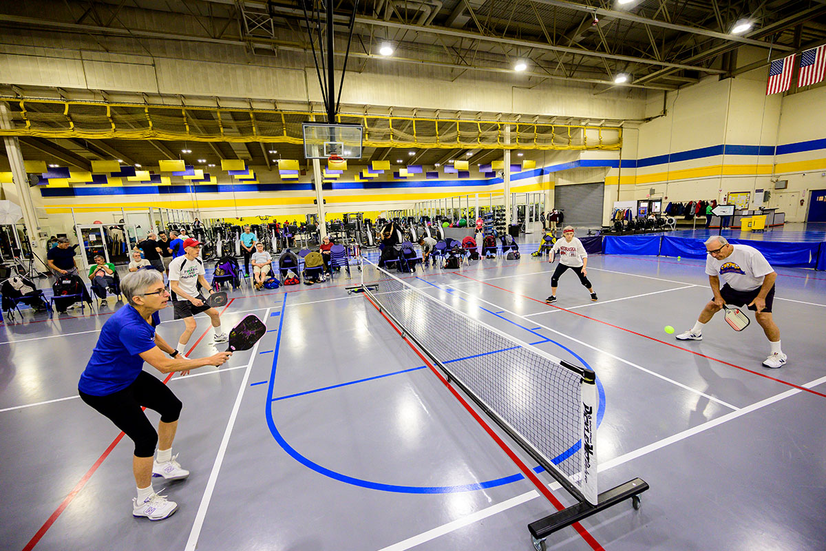 pickleball players on gray court in northern virginia