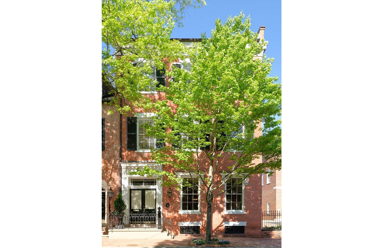 red brick home in alexandria virginia on saint asaph street with tree