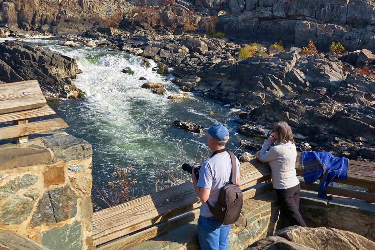 two people looking at waterfall at great falls park