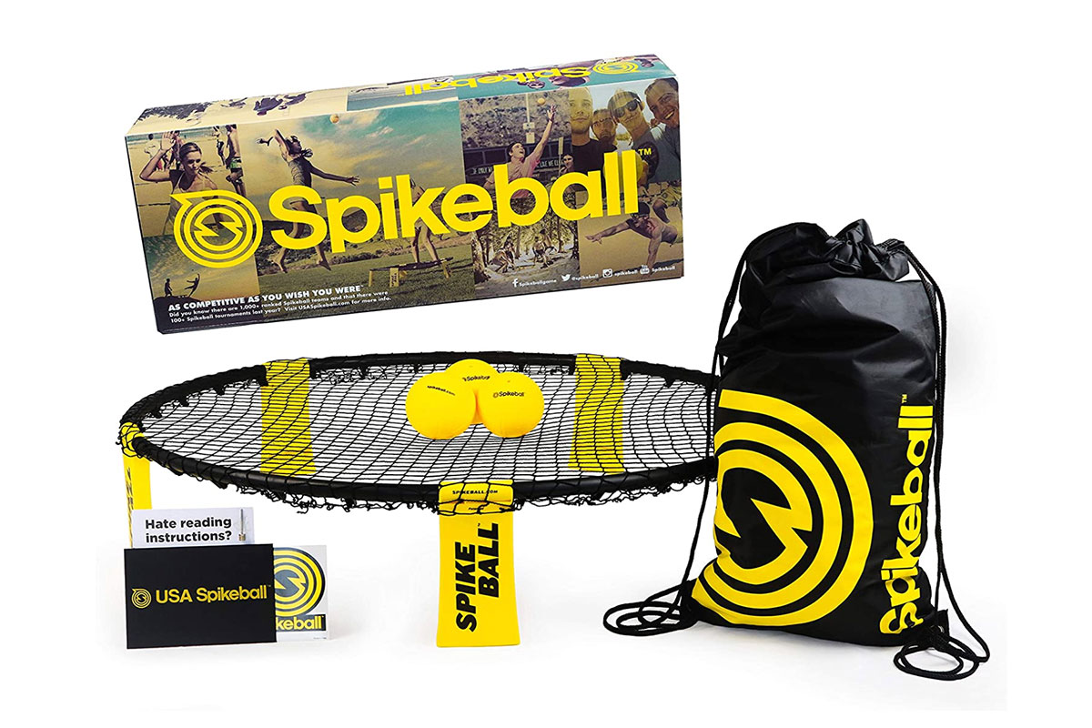 spikeball three ball game set with yellow balls and black netting to bounce and play