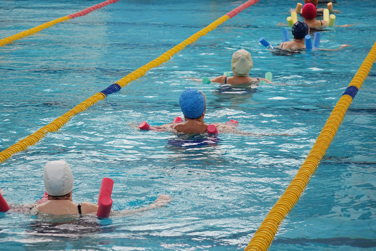 women doing water aerobics in pool