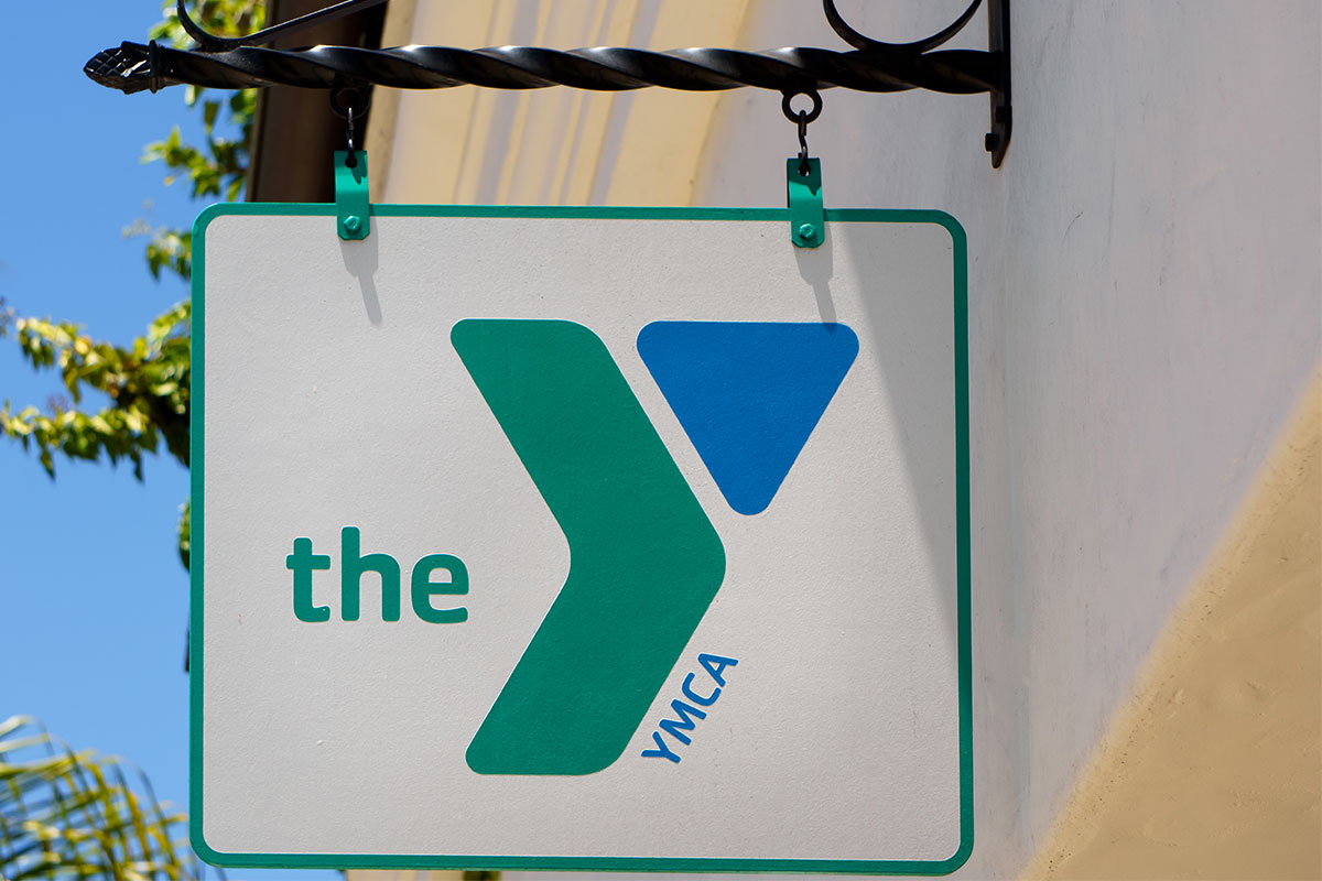 the ymca sign on side of building