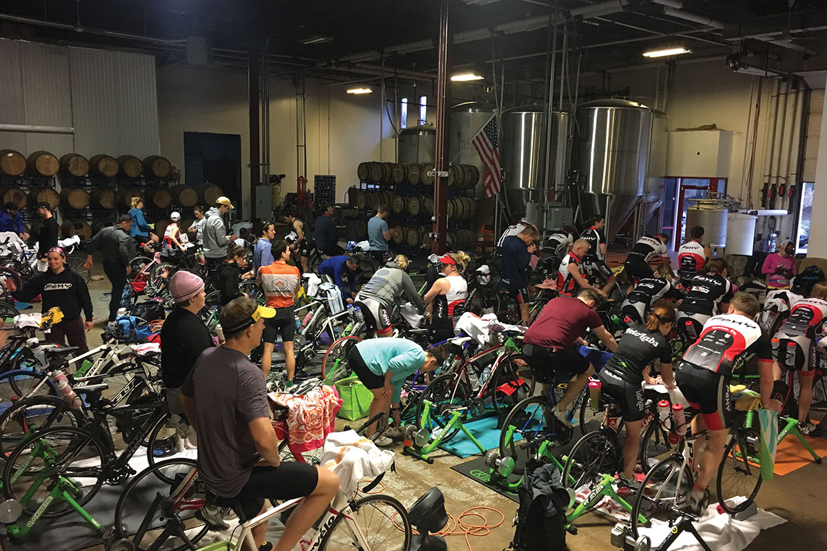 bikers and cyclists indoors training for triathlon at old ox brewing in ashburn loudoun county