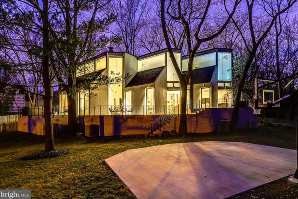contemporary style home at night in northern virginia expensive home sold in march 2020