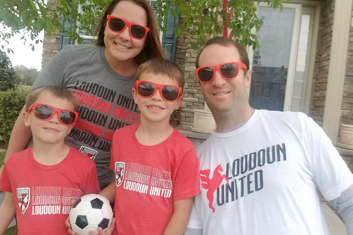 family dressed in loudoun united fc merchandise