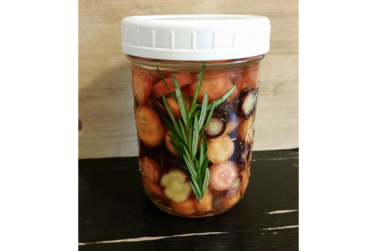 jar of fermented rainbow carrots
