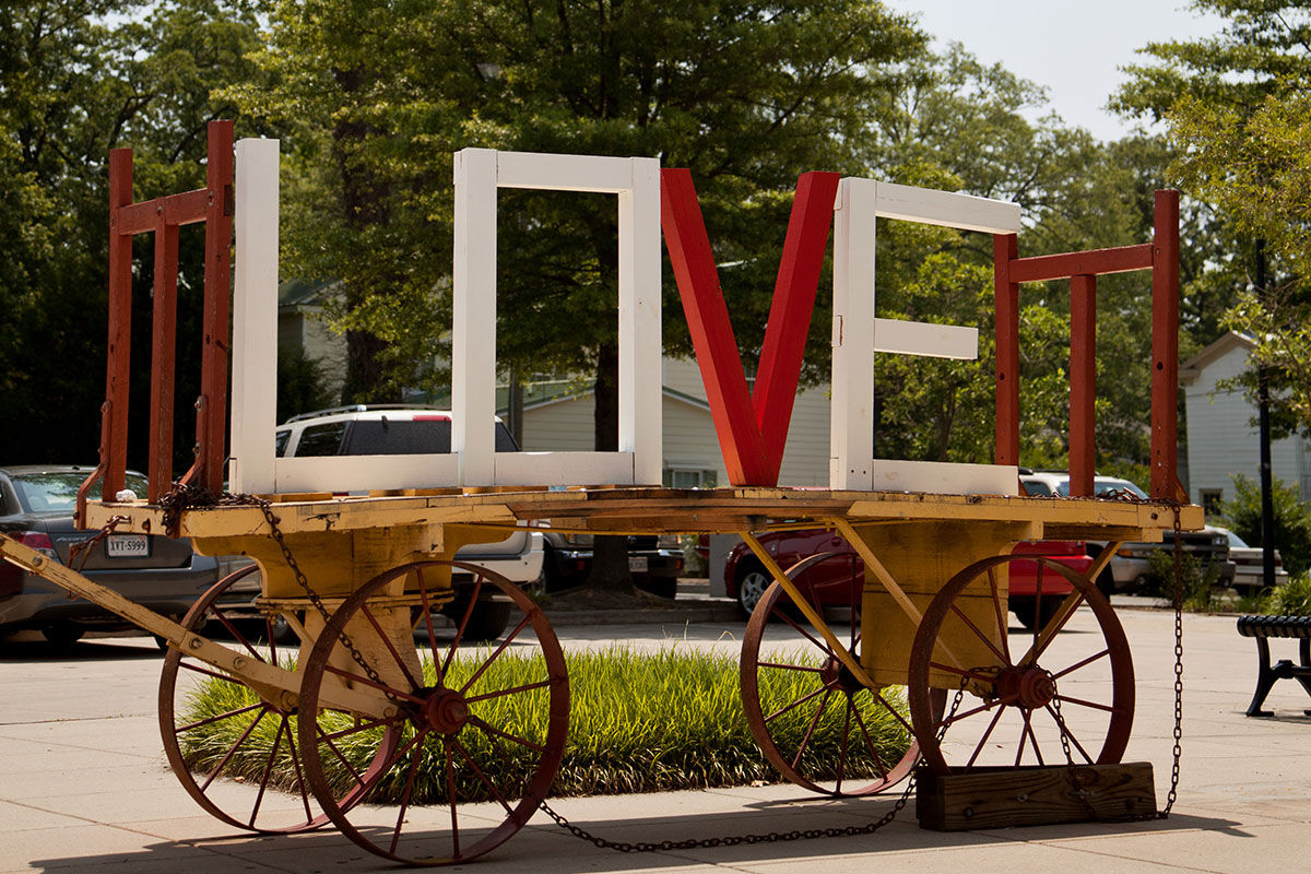 wooden love sign on carriage
