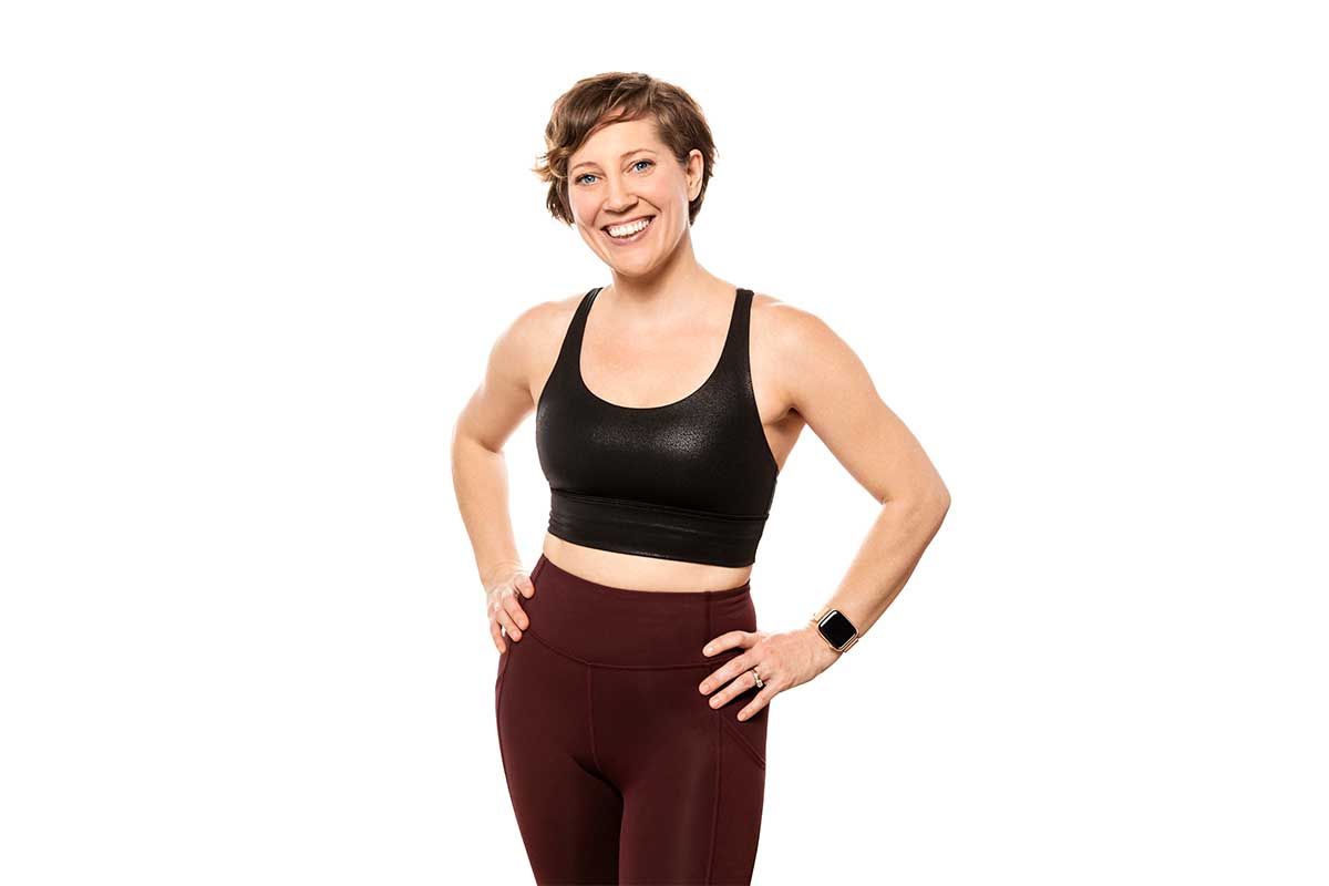 alison adams in black crop top and maroon yoga pants with white background homegrown power yoga