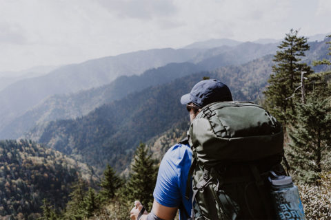 man with backpack on hiking the appalachian trail