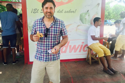 david guas in cuba eating a sandwich