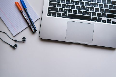 laptop and pens