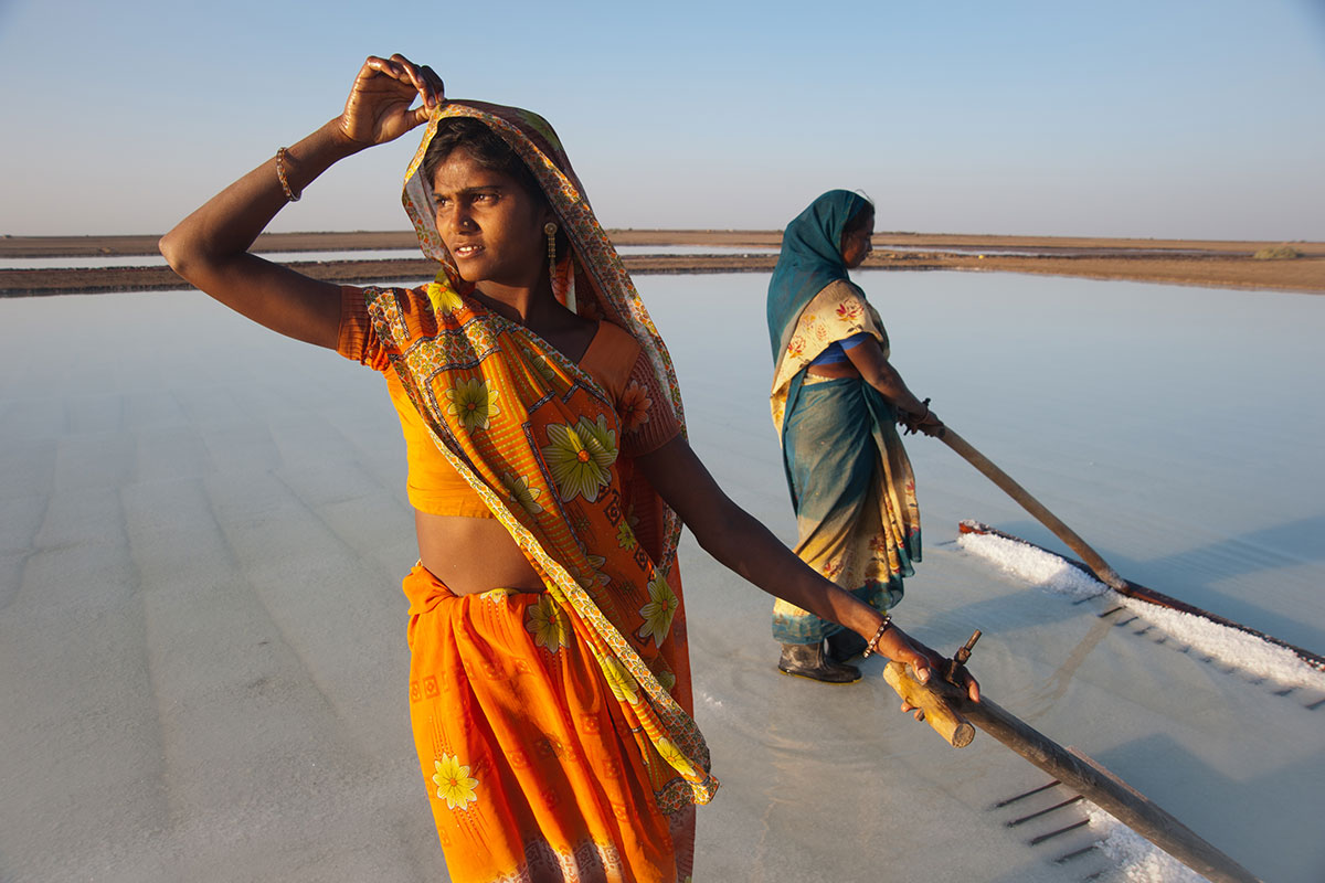 two women wearing saris in india