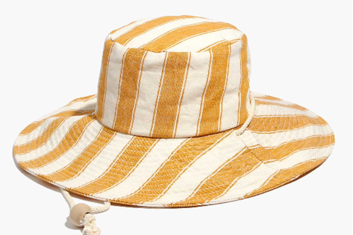 floppy hat with yellow and white stripes