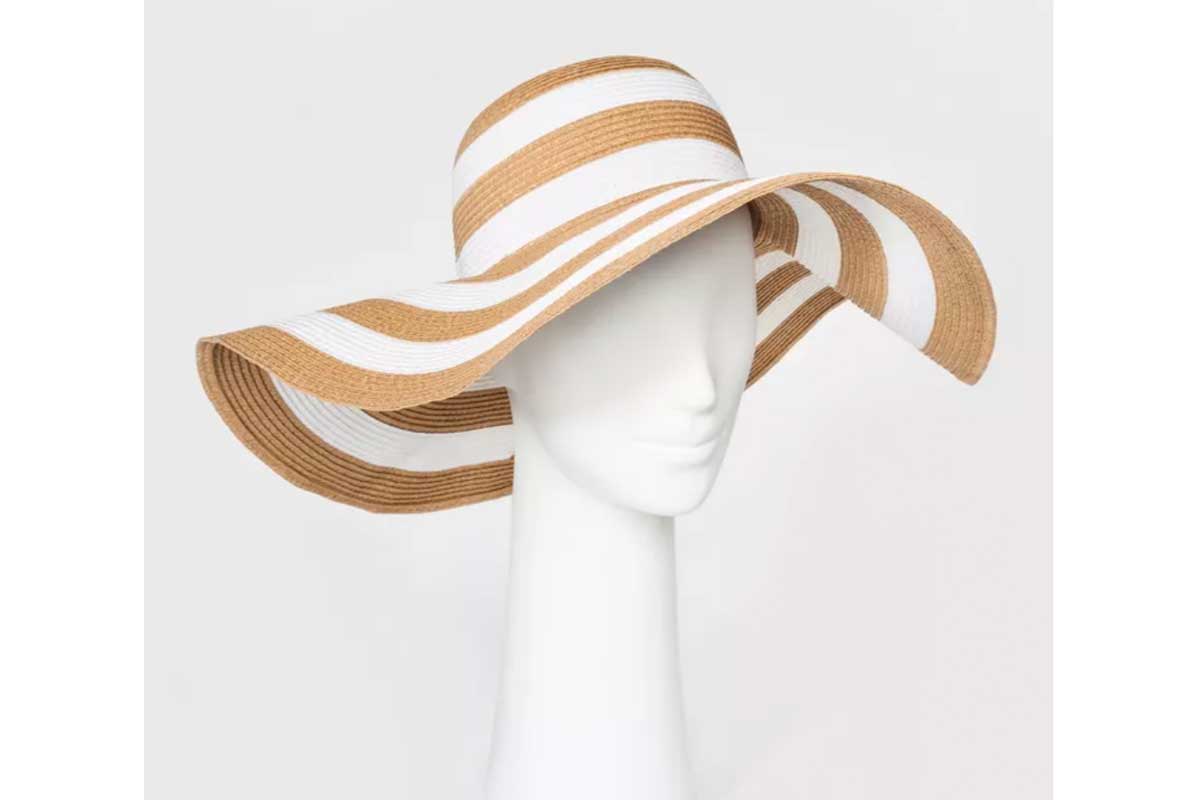 white and tan straw floppy hat