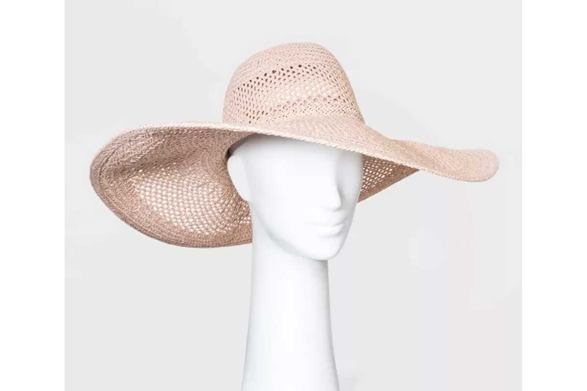 light pink floppy hat on white mannequin head