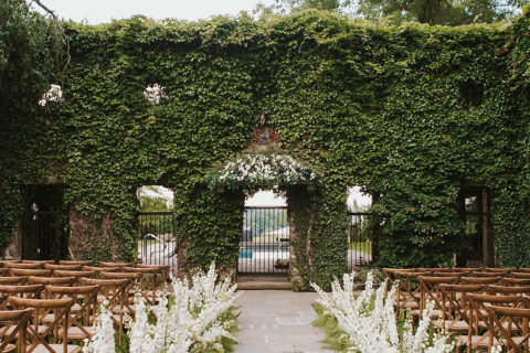 Goodstone Inn event setting with greens on the wall