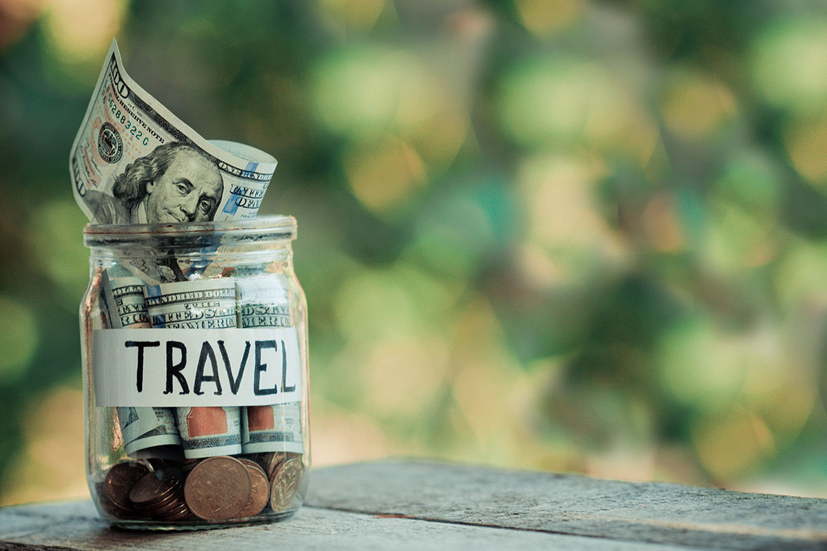 travel jar with money and change inside