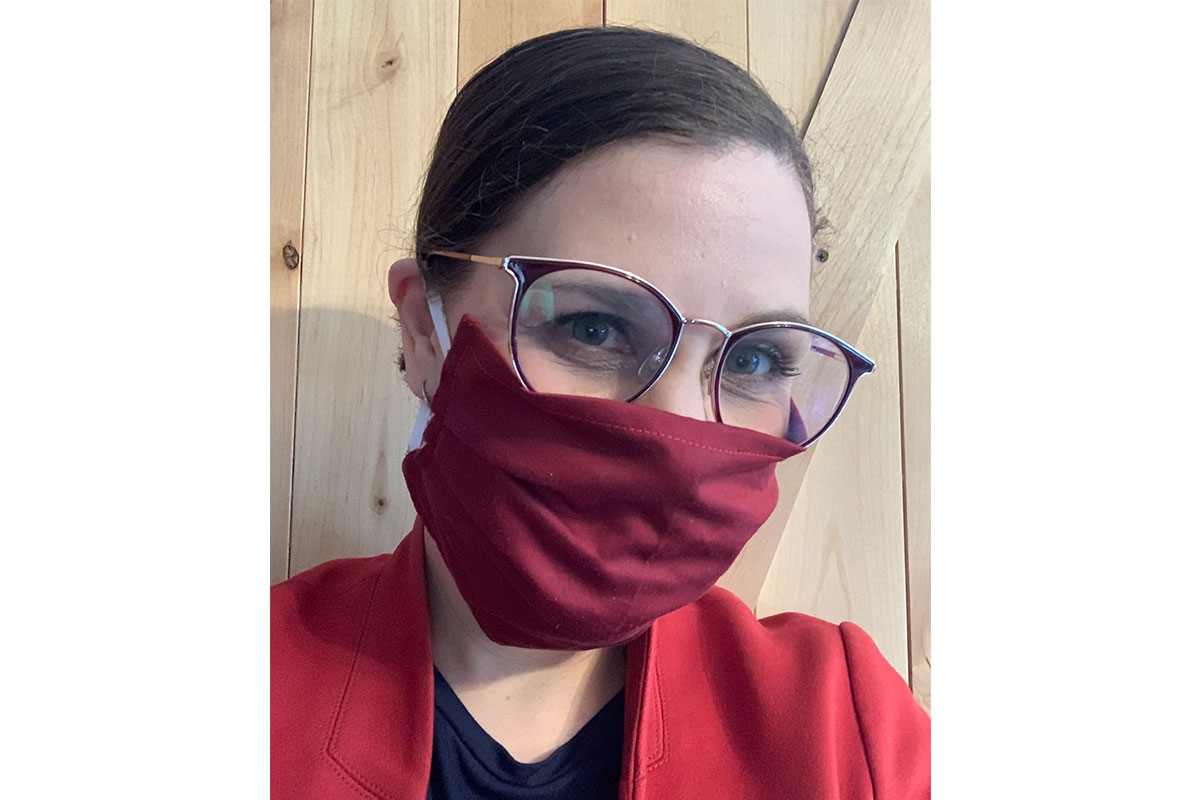 Lani Inlander selfie with red face mask and glasses on