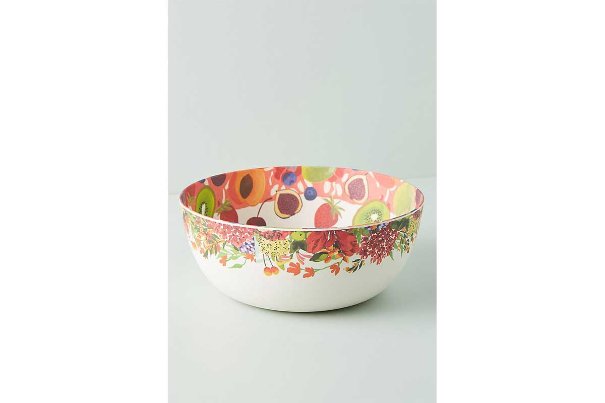 fruit bowl with kiwi apricot and other fruits on bowl