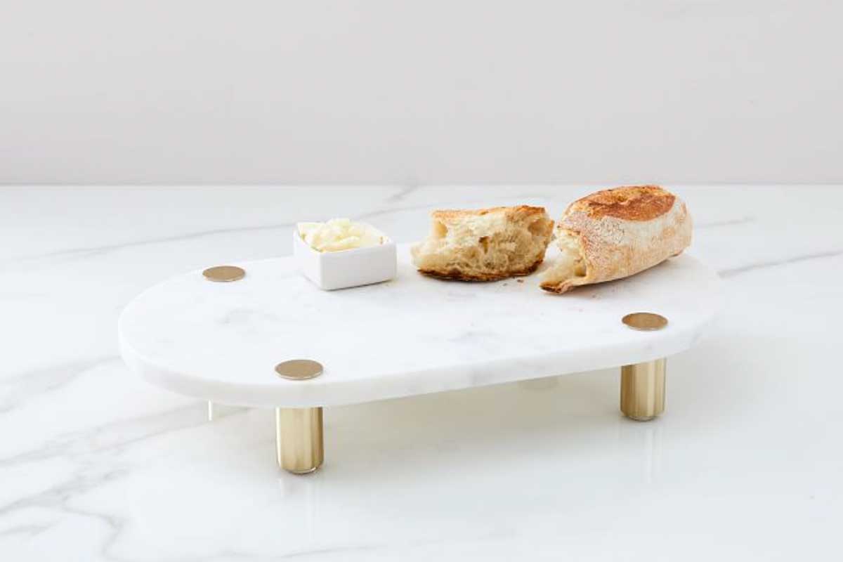 white marble tray with gold legs bread and butter