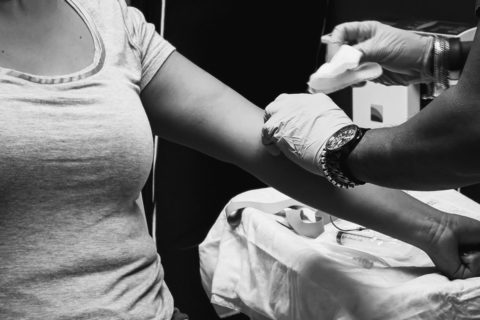 black and white photo of blood donation