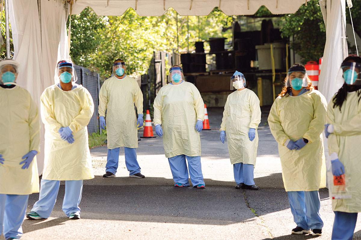 doctors and nurses standing at covid-19 testing site in ppe in northern virginia