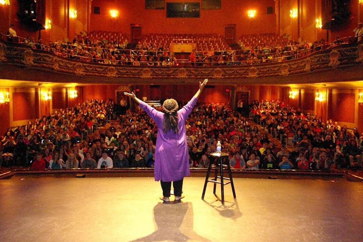 donna washington performing on stage in front of a crowd
