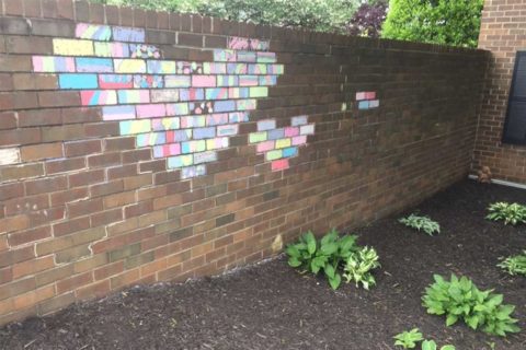 Two hearts drawn on wall