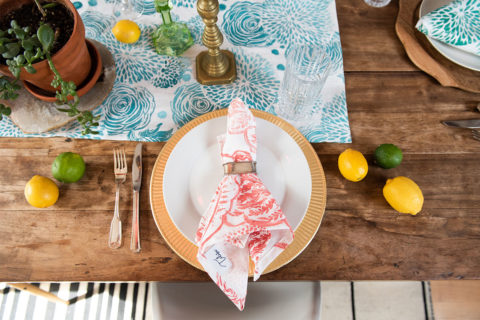 block printed napkin on top of a plate at set table